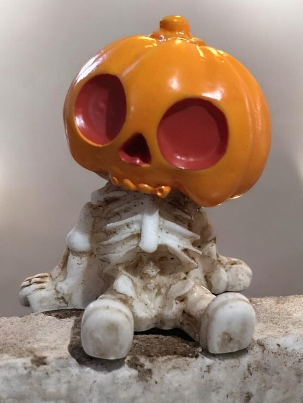 Halloween Pumpkin Skull Figurine - Orange & White Decorative Accent